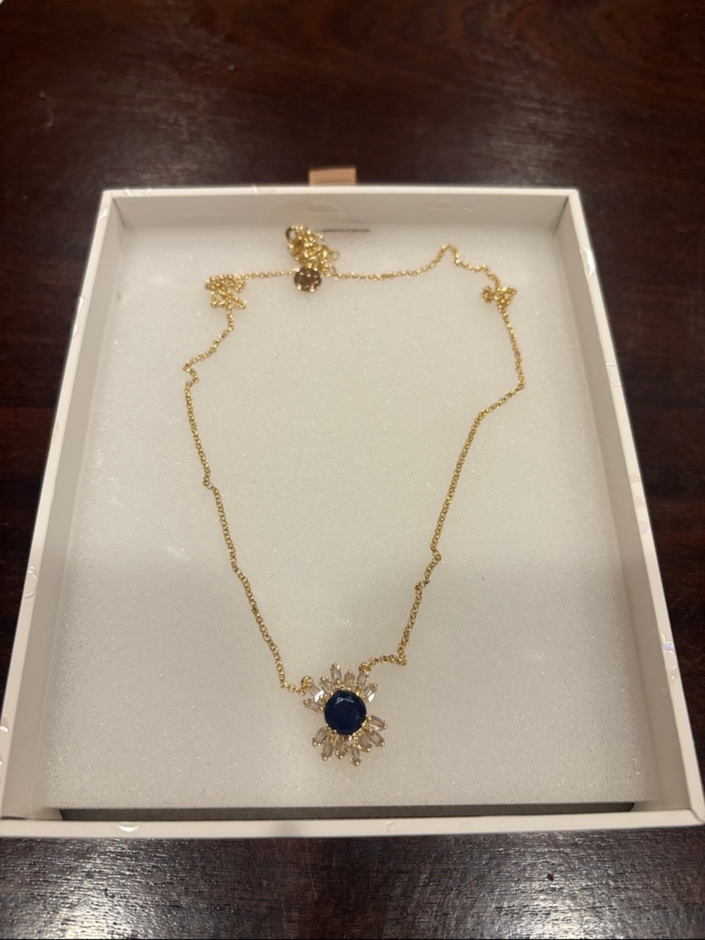 Gold-Plated Necklace with Navy Blue Sunburst Pendant
